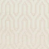 Close-up of the cream Ransom Area Rug. Hand woven wool shag rug with a geometric pattern. Contemporary style. Swatch