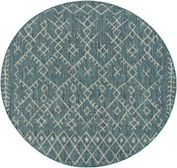 Close-up of a round Maunawili Aqua Nordic Rug. Features a geometric diamond pattern in aqua, black, taupe, and white. Design-Round-67