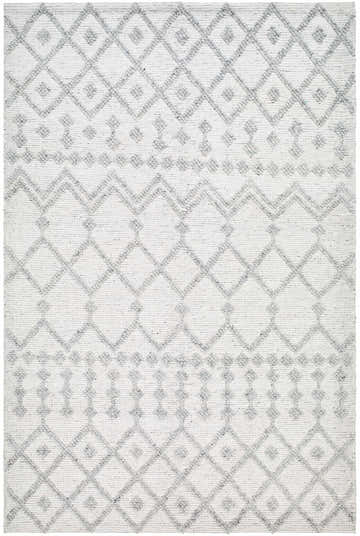 Close-up of the Rick Area Rug. Hand-woven rug with an arctic stone base and dark gray geometric diamond pattern. Design-Rectangle-576