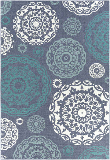 Reasnor Area Rug close-up: navy olefin rug with pale blue, teal, and white medallion floral pattern. Coastal style. Design-Rectangle-76109