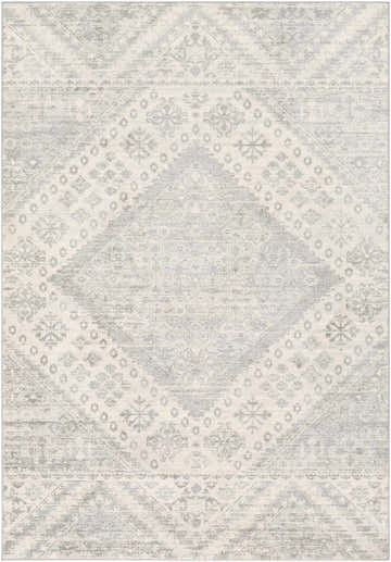 Close-up of the Renton Area Rug, a machine-woven rug in gray, ivory, and silver gray with a Bohemian-inspired geometric pattern. Design-Rectangle-5373
