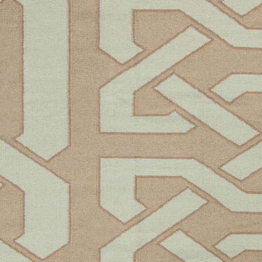 Close-up of the Rhodell Area Rug. Hand-woven wool rug with a geometric pattern in light beige and gray. Swatch