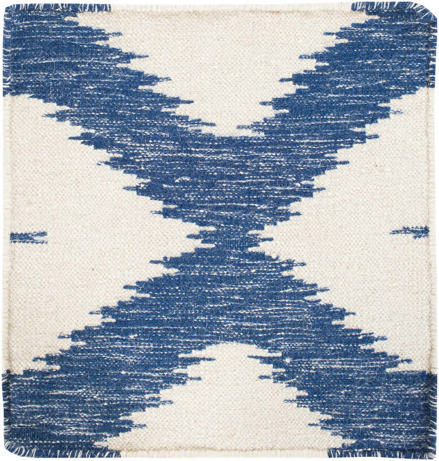 Close-up of the Oradell Blue Ikat Wool Rug. Hand-woven rug in cream and navy with a geometric ikat pattern. Swatch
