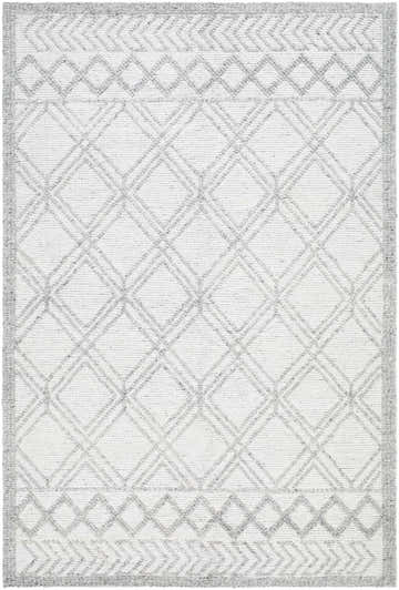 Close-up of the Rena Area Rug. Hand-woven farmhouse style rug in arctic stone, dark gray, and gray with a geometric diamond pattern. Design-Rectangle-576