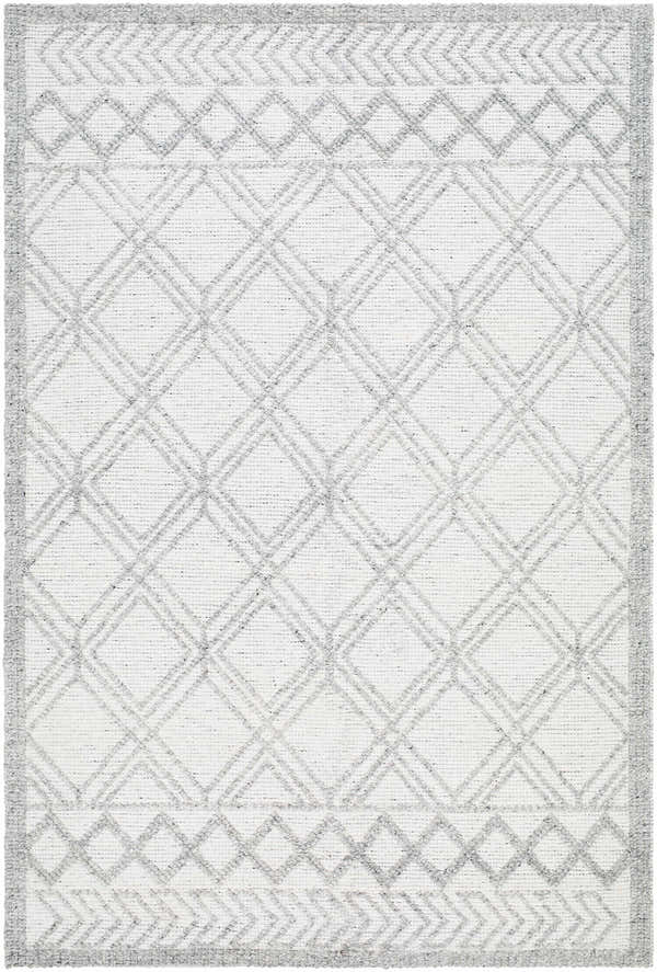 Close-up of the Rena Area Rug. Hand-woven farmhouse style rug in arctic stone, dark gray, and gray with a geometric diamond pattern. Design-Rectangle-576