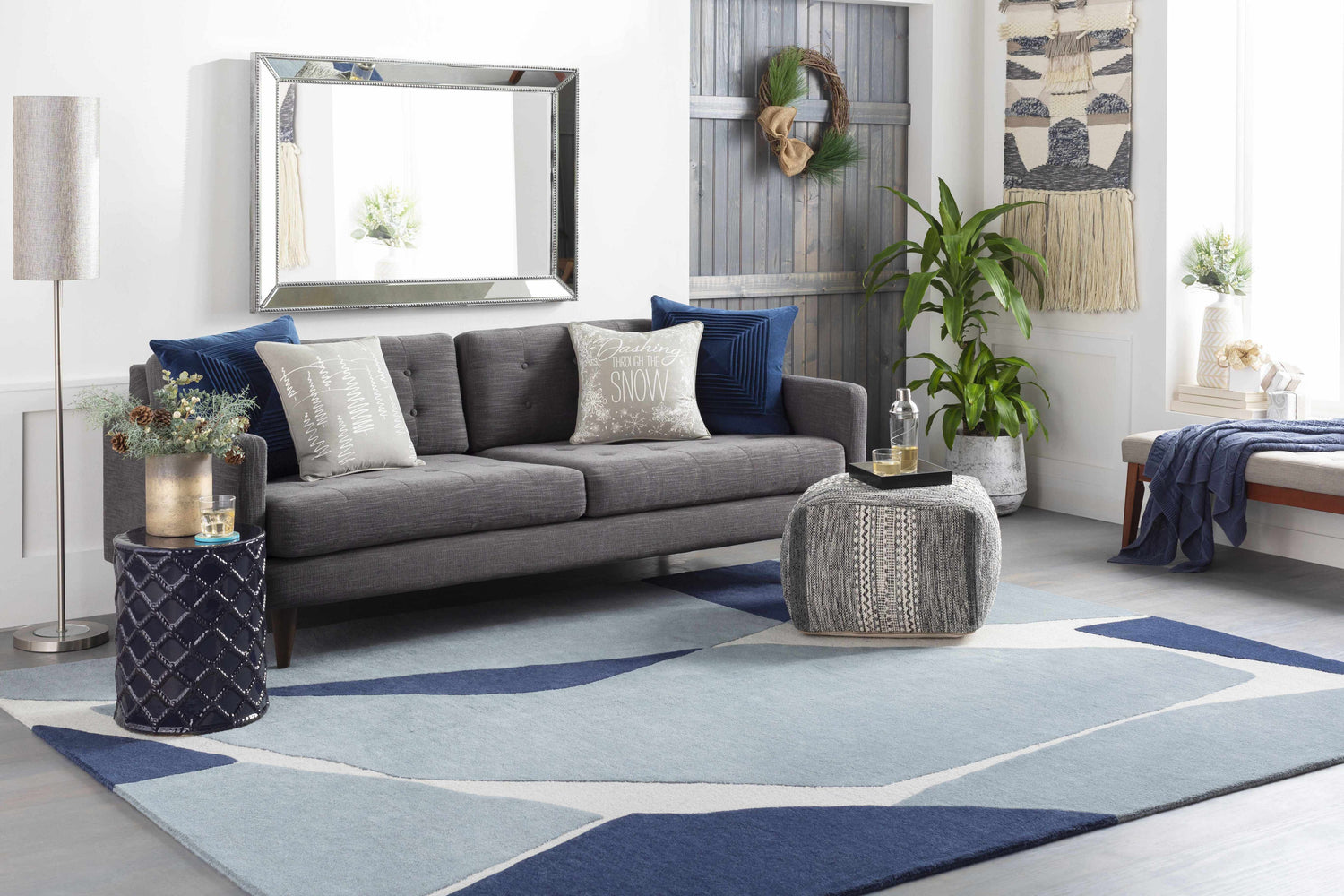 Living room scene with gray sofa and blue Robbins Modern Blue Wool Rug featuring geometric pattern. Roomscene-Rectangle