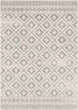 Close-up of the Romeoville Area Rug: a machine-woven rug with gray diamond and geometric patterns on a white background. Design-Rectangle-5373