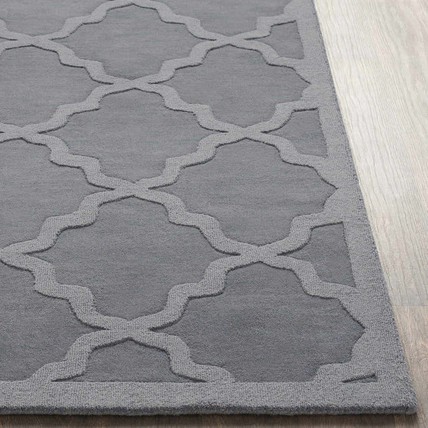 Close-up of the gray Ropesville Wool Area Rug showing its hand-loomed texture and contemporary trellis pattern. Front