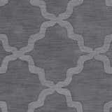 Close-up of the gray Ropesville Wool Area Rug featuring a contemporary quatrefoil pattern and hand-loomed texture. Swatch