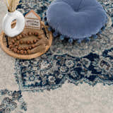 Close-up of the Istanbul Blue Area Rug showing its ivory, navy, and gray Persian-inspired design and soft texture. Styleshot
