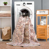 Laundry room scene with Flat Pile Urpi Red Washable Rug being washed in a white washing machine. Washing-Machine
