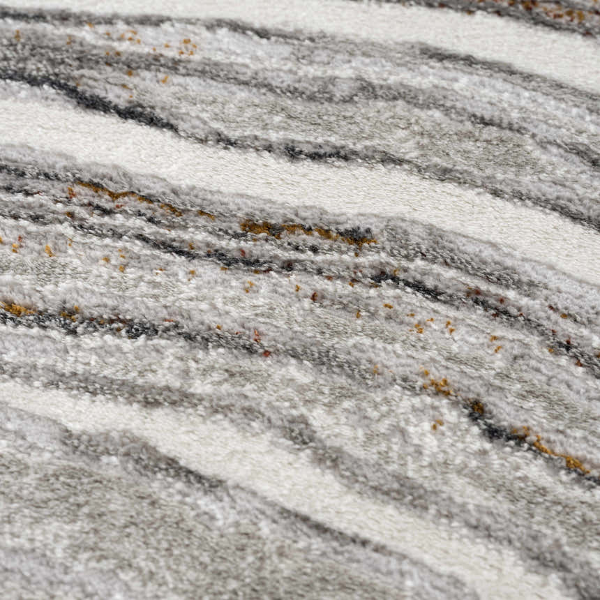 Close-up of the Live Marble Dark Gray Area Rug. Features charcoal, light gray, off-white, and rust colors in a wavy, textured pattern. Texture