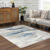Living room scene with a Live Marble Blue Area Rug, gray sofa, wood cabinet, and modern decor. Roomscene-Rectangle