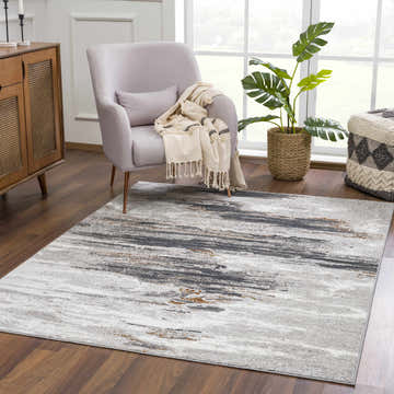 Living room scene with gray armchair and Live Marble Gray Area Rug. Contemporary style. Roomscene-Rectangle