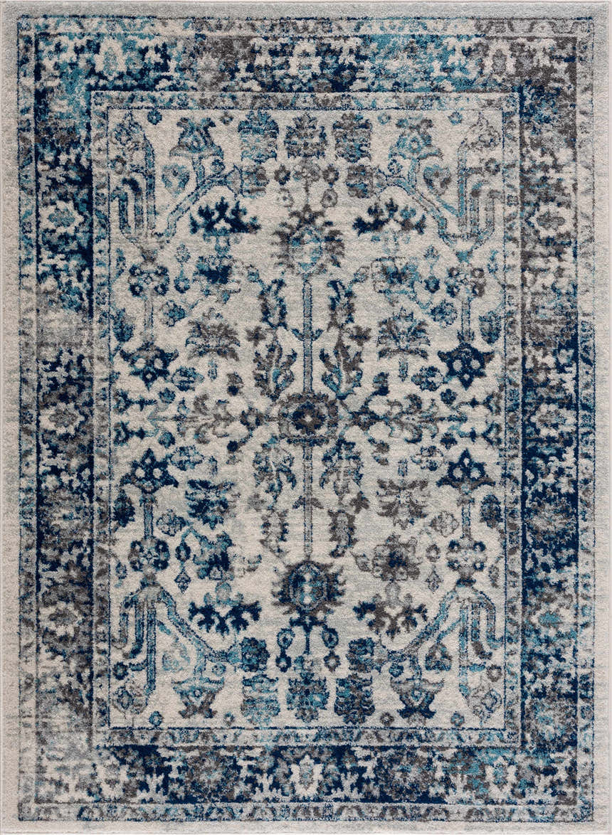 Close-up of the Istanbul Vintage Blue Area Rug, showcasing its ivory base and navy, gray, and blue traditional, oriental pattern. Design-Rectangle