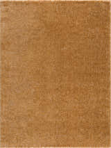 Close-up of a Heavenly Solid Mustard Plush Rug, showing the soft, shag texture and warm, golden mustard color. Design-Rectangle