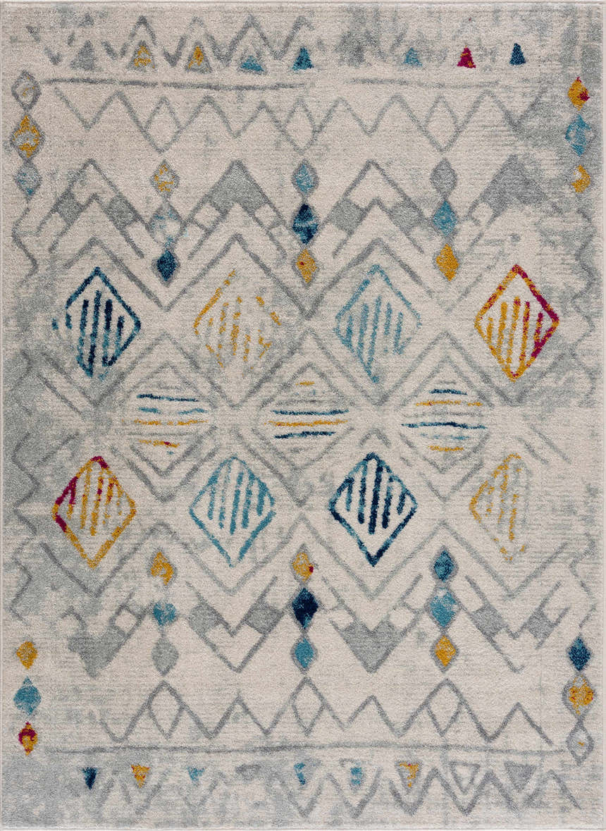 Close-up of Istanbul Aztec Area Rug with geometric pattern in light gray, blue, mustard, and pink on off-white. Design-Rectangle