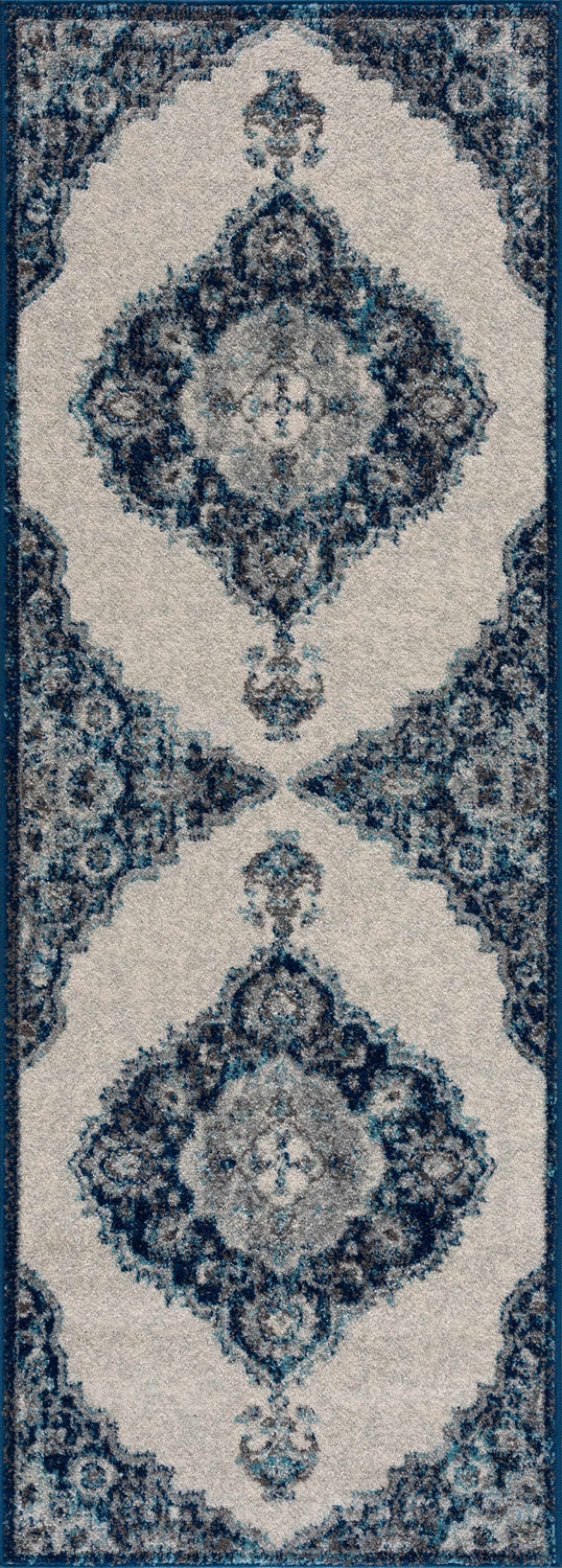 Close-up of the Istanbul Blue Area Rug, featuring a traditional navy and ivory Persian-inspired design. Design-Runner
