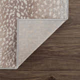 Close-up of the Pointblank Tan Leopard Print Rug showing the animal print design and rug backing. Fold