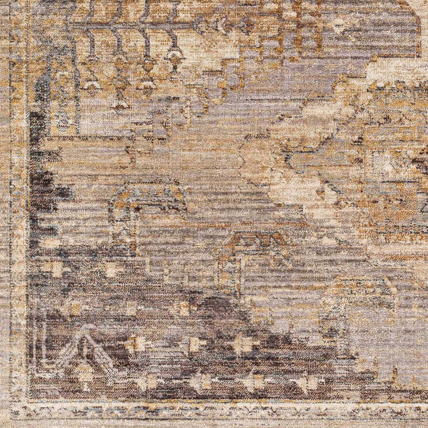 Close-up of Clegg Luxe Rug, machine woven with a traditional pattern in beige, gray, and tan hues. Swatch