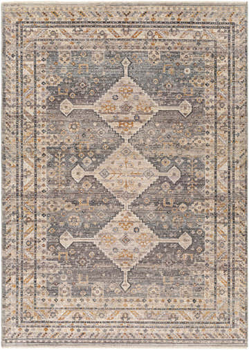 Detailed Lyam Luxe Rug close-up. Beige, charcoal, and gray tones with a Southwestern-inspired diamond pattern. Design-Rectangle-579