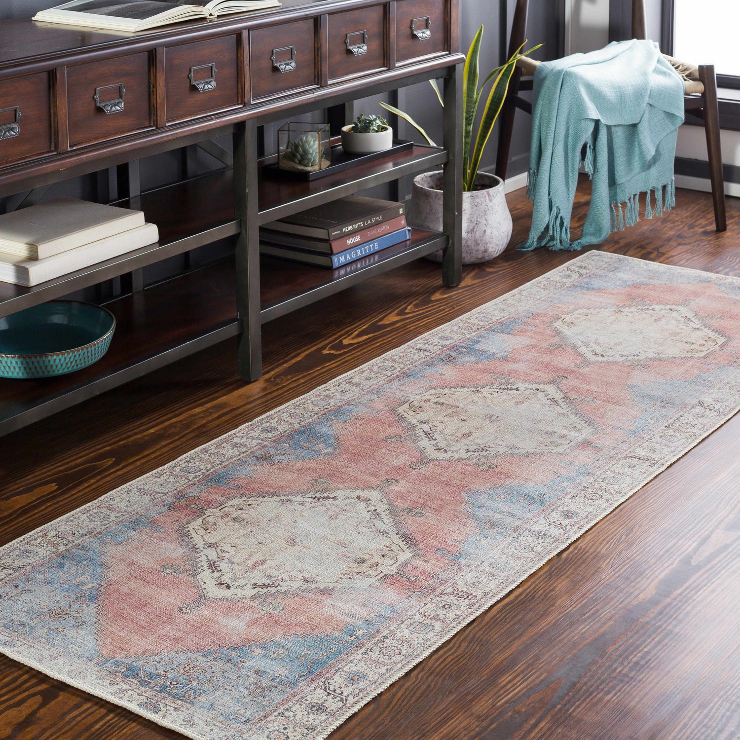 Entryway with Sacriston Washable Area Rug runner in aqua, rose, and tan colors, styled with a console table and wood floors. Roomscene-Runner