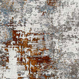 Close-up of the Ansel Area Rug. Contemporary design with rust, gray, ivory, and navy abstract pattern. Swatch