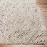 Close up of a Beige Garza Diamond Textured Washable Rug showing the diamond pattern and soft texture. Front