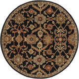 Close-up of round Salix Hand Tufted Black Wool Rug with brick red, camel, and mustard floral pattern. Design-Round