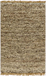 Close-up of the Tan Gopi Area Rug. Tan, taupe, and black fibers create a textured, hand-woven design with fringe. Design-Rectangle-4117
