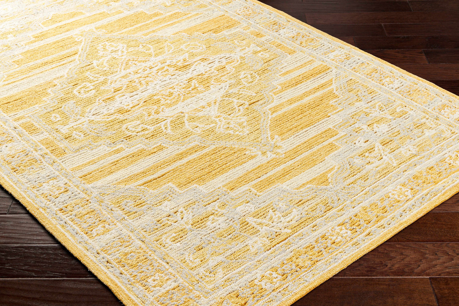 Close up of the Nani Camel Wool Blend Area Rug showing its farmhouse design and wool texture. Corner