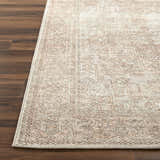 Close-up of the Margot Medallion Dusty Coral rug showing beige, bone, and coral tones with a traditional medallion pattern. Front