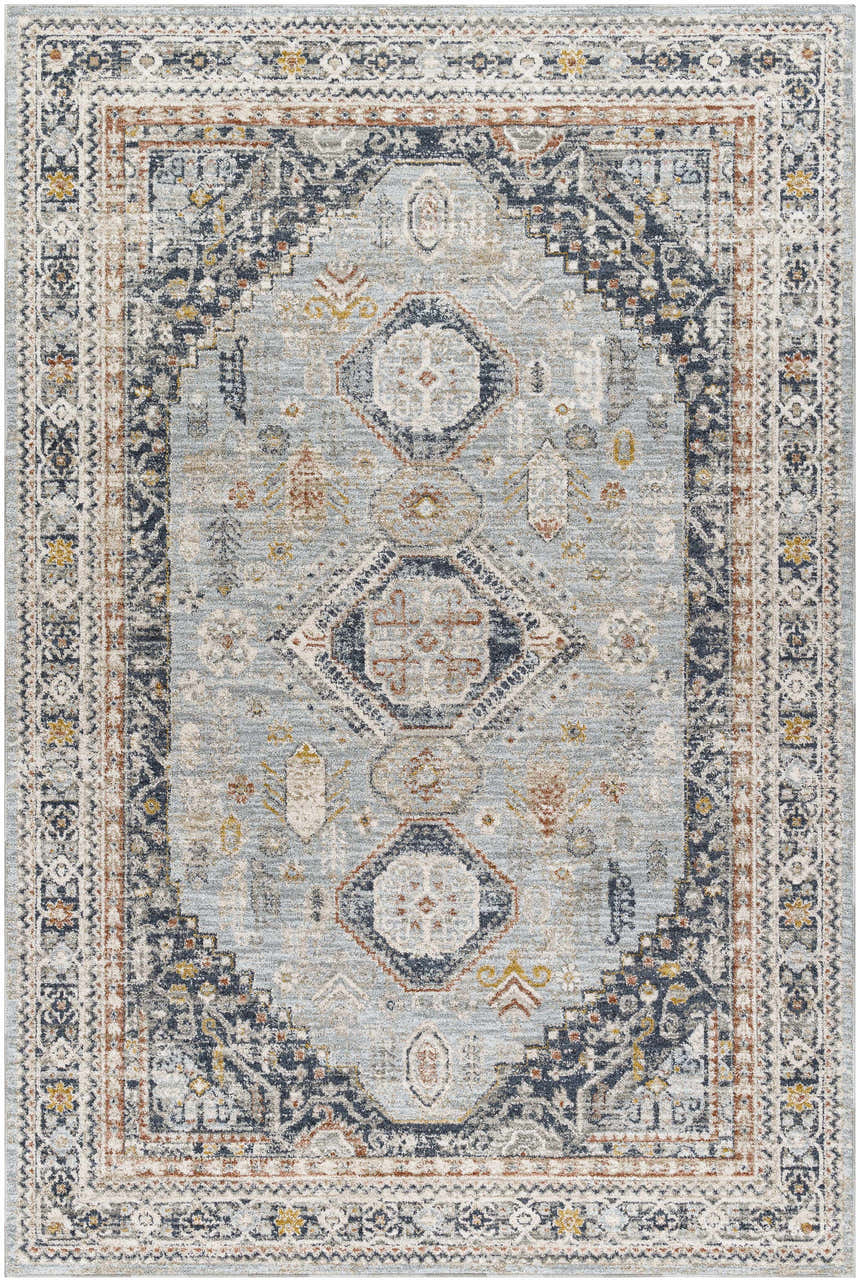 Detailed view of the Gilda Area Rug in light gray and natural gray with a traditional, geometric pattern. Design-Rectangle-6796