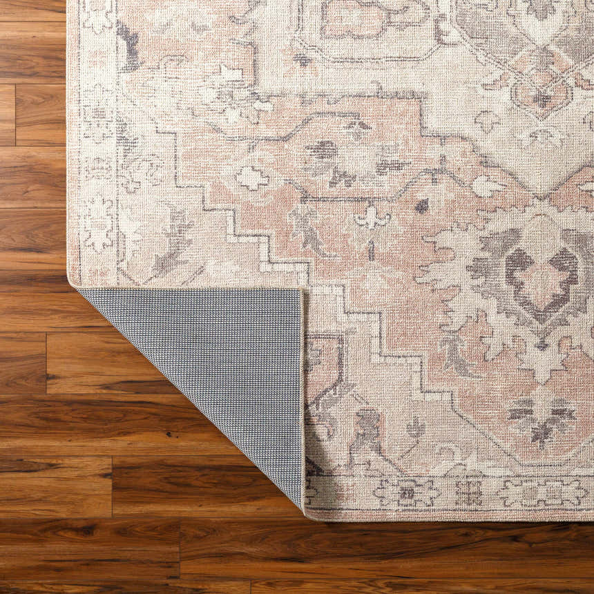 Close-up of Elle Medallion Taupe Area Rug showing beige, gray, and pastel red colors and traditional medallion pattern. Back