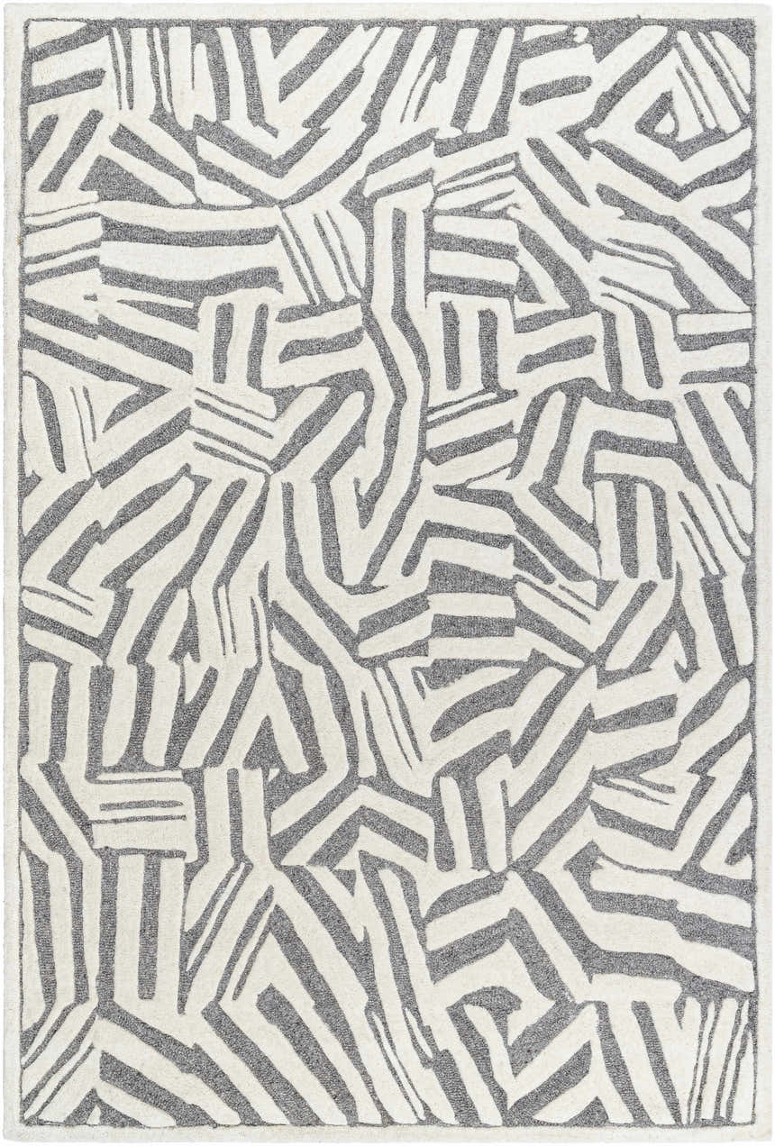 Close-up of the Avian Gray Wool Area Rug featuring a contemporary cream and taupe geometric design. Design-Rectangle-576