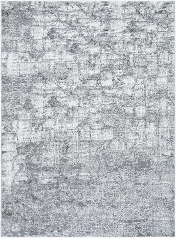 Close-up of the Suubi Area Rug, showcasing its light silver, silver gray, and slate blue abstract design. Design-Rectangle-5373