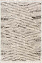 Close-up of the Brita Area Rug. Bone and dark brown geometric pattern with a flat pile and short fringe. Bohemian style. Design-Rectangle-537