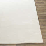 Close-up of the hand-knotted Sabinsville Carpet. Neutral cream color with subtle horizontal texture. Farmhouse style. Front