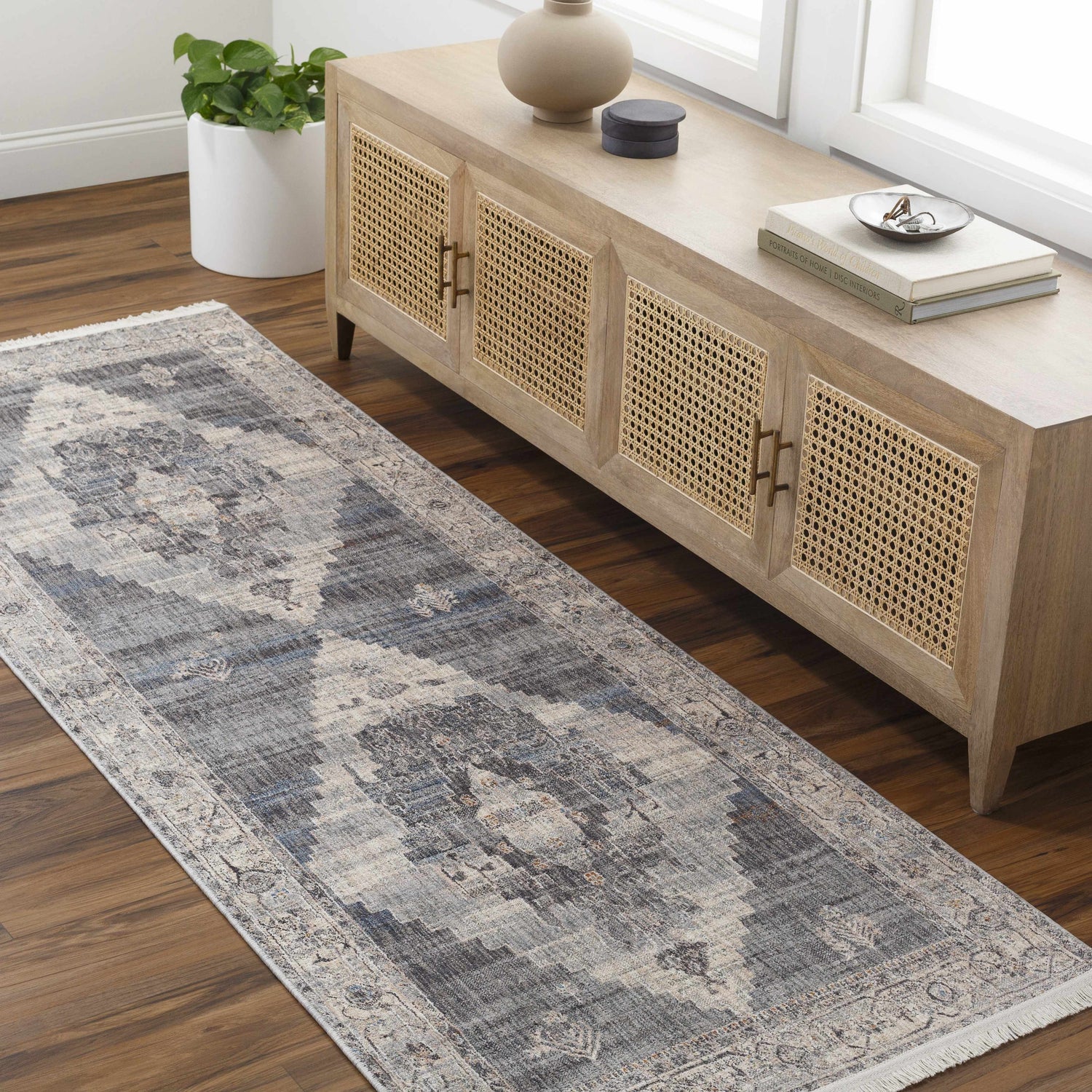 Entryway with Unna Area Rug runner in dusty sage, eggplant, and taupe. Farmhouse style console table and wood floors. Roomscene-Runner