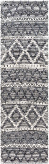 Close-up of the Yuka Area Rug. Hand-woven rug with a geometric diamond pattern in dark gray and natural gray. Design-Runner-268