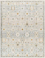 Close-up of Annie Green Textured Rug with Fringes. Farmhouse style rug with floral pattern in green, gold, and blue tones. Design-Rectangle-710103