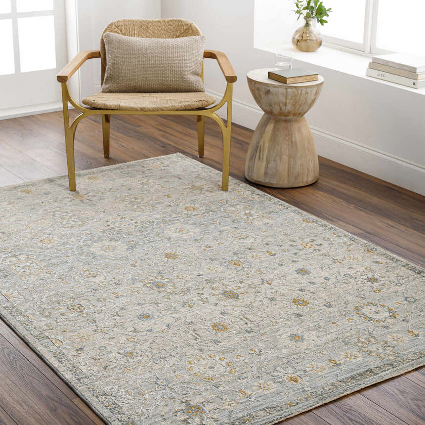 Living room scene with Annie Green Textured Rug, woven chair, and wood side table. Roomscene-Rectangle