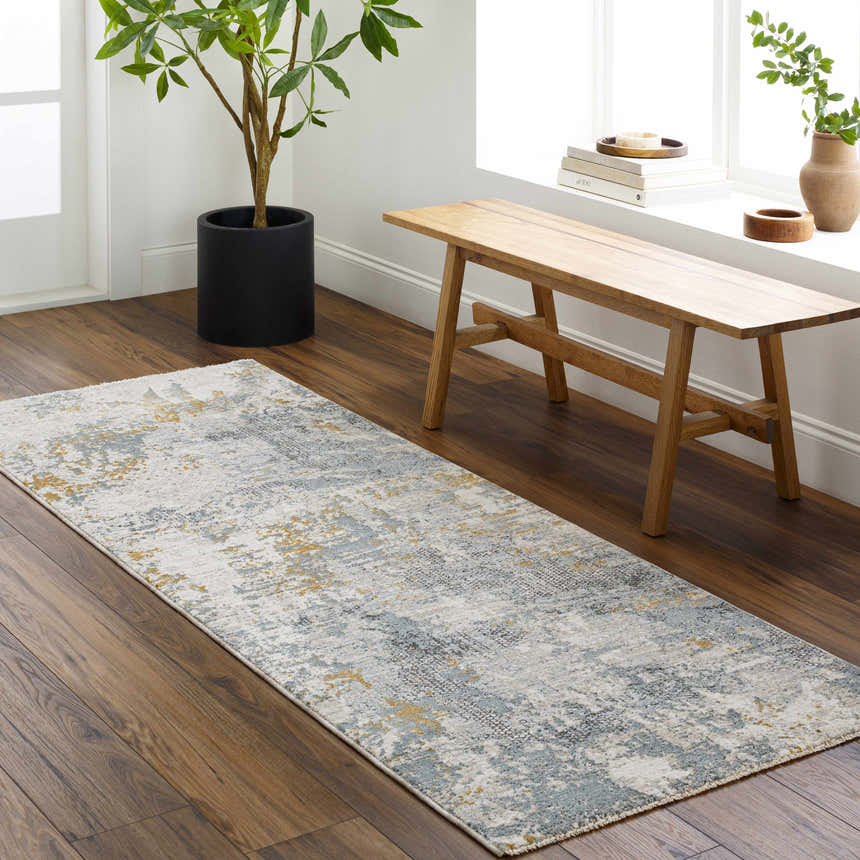 Entryway scene with Chaya Textured Abstract Rug runner in dusty sage, blue, gray, and mustard colors on wood floor. Bench and plant. Roomscene-Runner