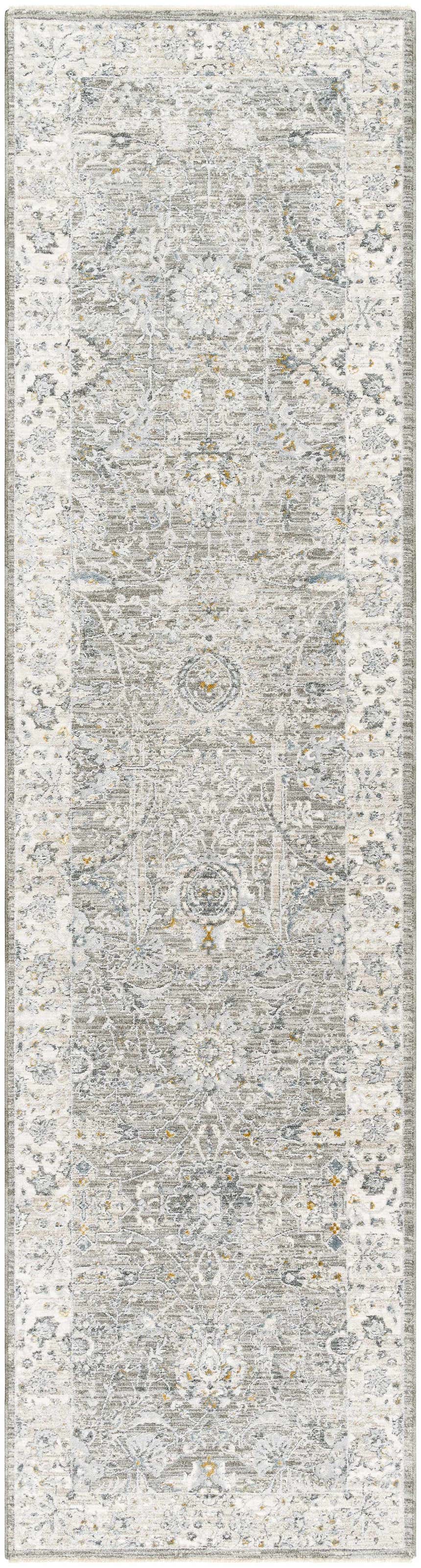 Close-up of the Gauge Gray Blue Textured Rug. Features a traditional, distressed pattern with gray, blue, and brown tones. Design-Runner-2710