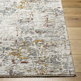 Close up of the light gray Kasim Textured Rug with Fringes, showing its contemporary pattern and soft texture. Front