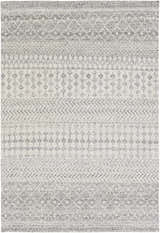 Close-up of the Seafield Indoor Outdoor Rug. Gray, off-white, and slate blue bohemian pattern. Hand woven texture. Design-Rectangle-576