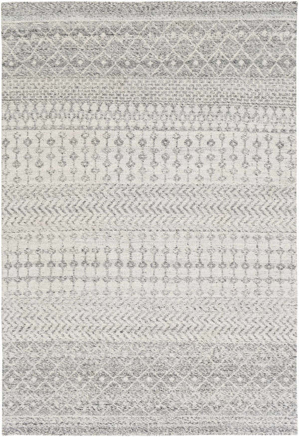 Close-up of the Seafield Indoor Outdoor Rug. Gray, off-white, and slate blue bohemian pattern. Hand woven texture. Design-Rectangle-576