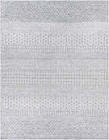 Close-up of the Seafield Indoor Outdoor Rug. Gray, off-white, and blue hues with a woven bohemian pattern. Design-Rectangle-810