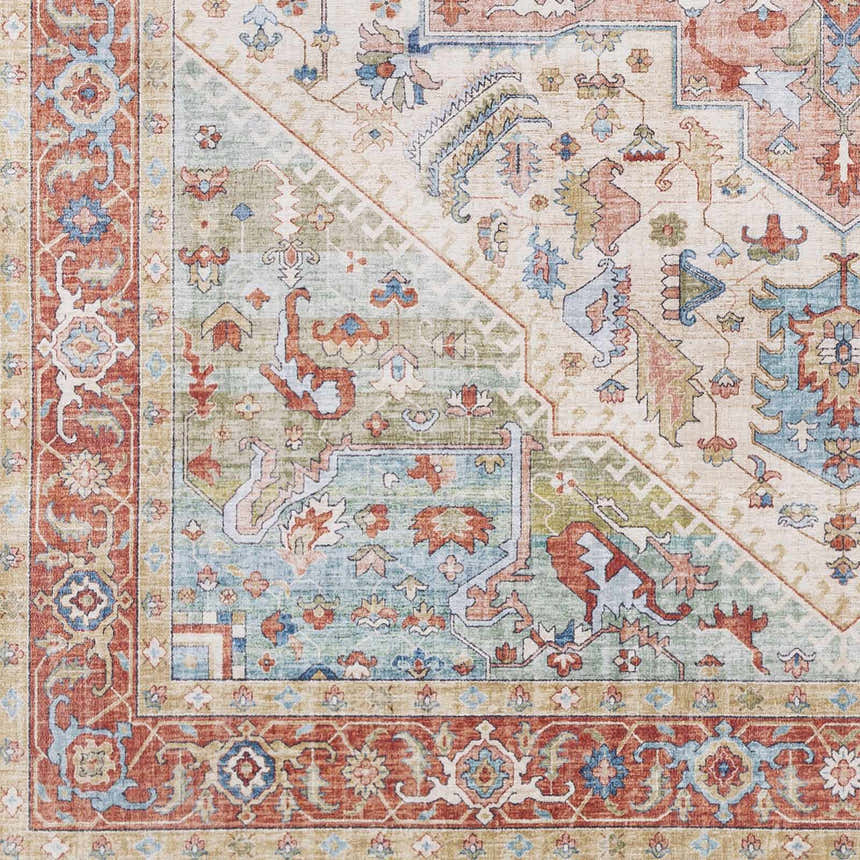 Close-up of the Selbyville Area Rug, featuring a traditional design in brick red, emerald, light blue, and beige tones. Swatch