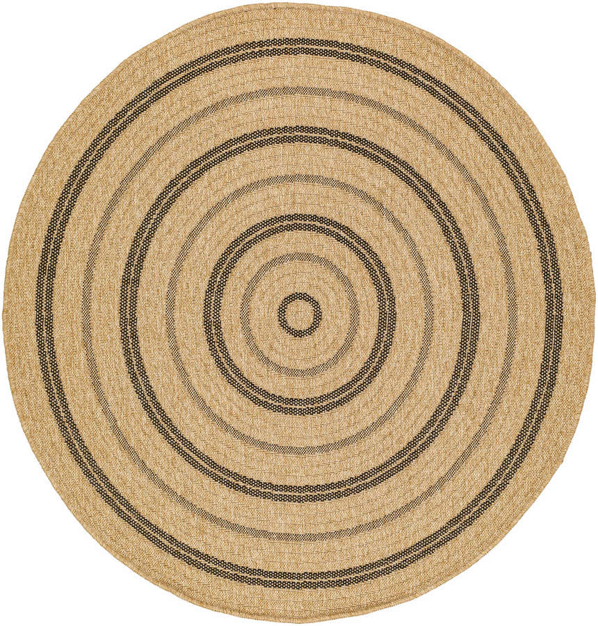 Close-up of round Beril Area Rug. Tan rug with charcoal concentric circles. Farmhouse style. Design-Round-53